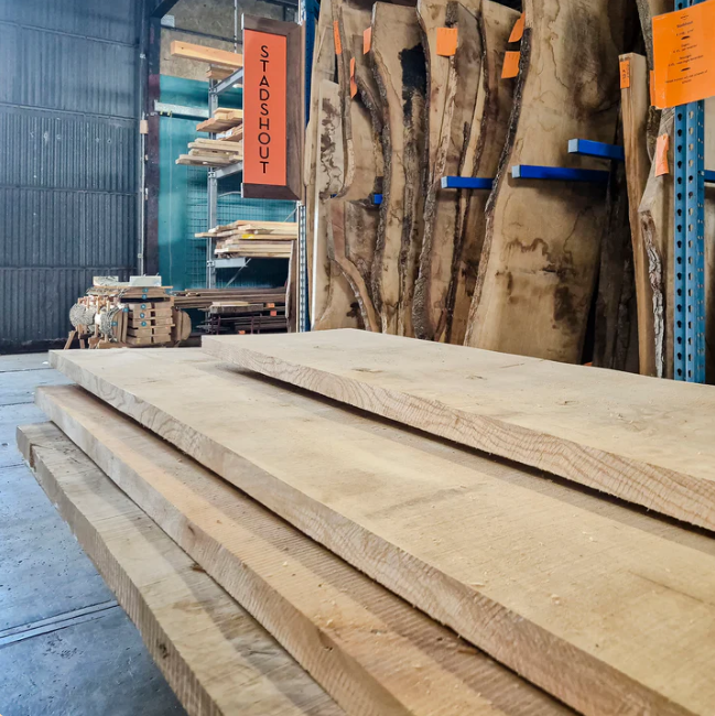 Custom event trophies: The complete guide to designing awards 10 Stadshout warehouse with planks of wood from felled urban trees